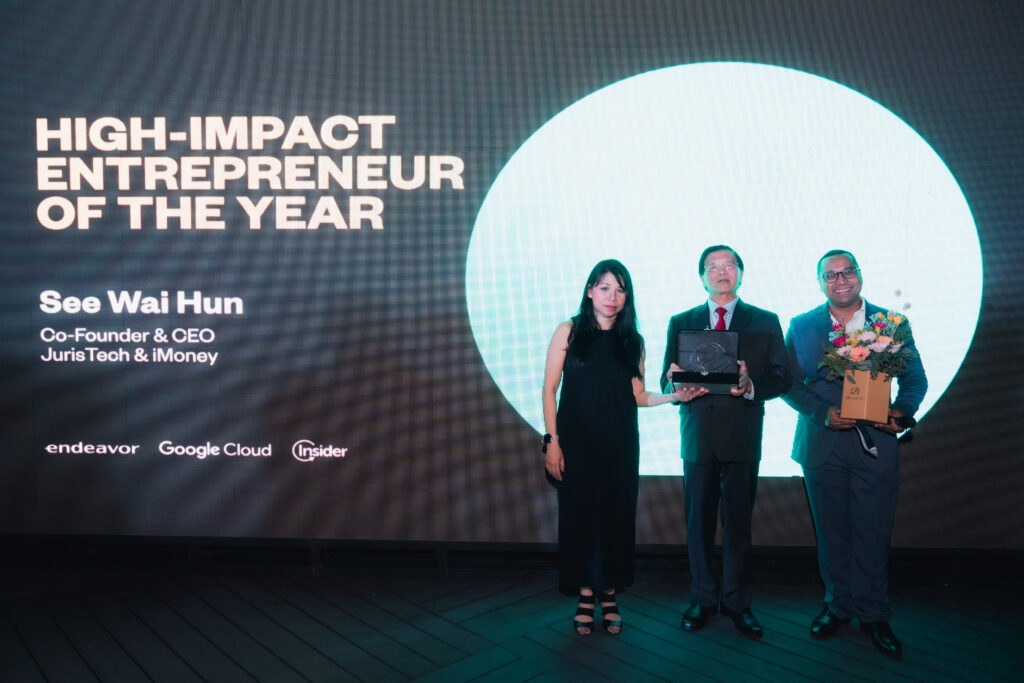 Wai Hun winning the high impact entrepreneur award from endeavor