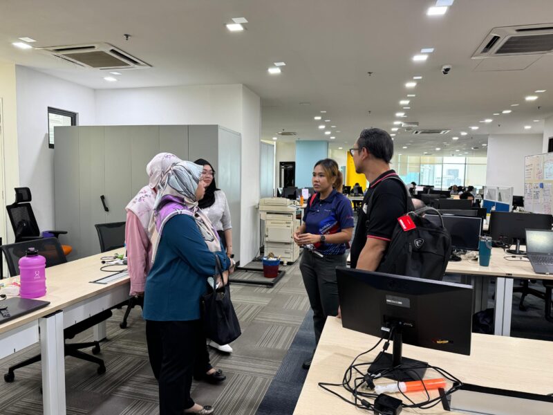 JurisTech representatives guiding Taylor's Work-Based Learning programme attendees to an office tour 