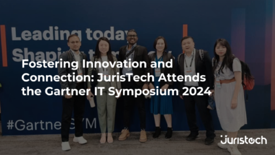 6 people posing for a formal photo at the Gartner Symposium.