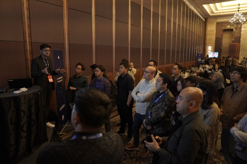 The audience listening attentively to the practical AI applications of AI in financial services presentations during the interactive breakout sessions at the GenAI Innovation Nexus in Indonesia