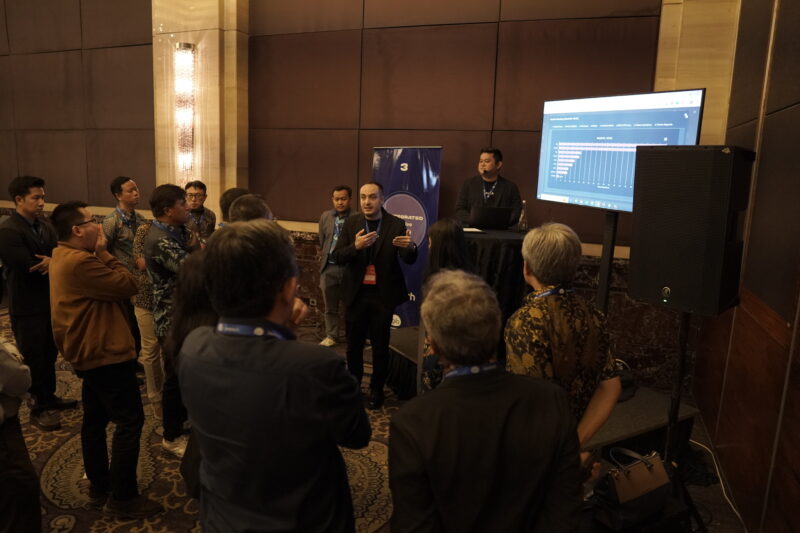 Hosein Abedinpourshotorban, Chief Innovation Officer (CINO) of JurisTech, sharing insights on Generative AI’s role in transforming data analysis in the financial industry at the GenAI Innovation Nexus in Indonesia