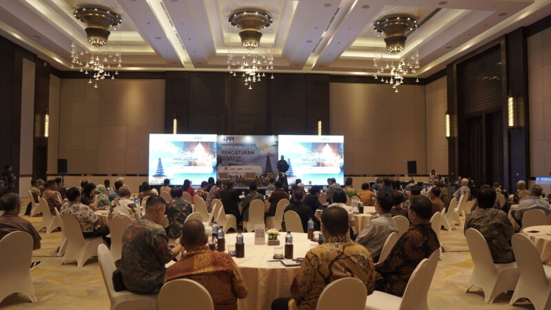 Crowd of Microfinance Representatives Listening to Speaker at APPI's National Seminar 2024